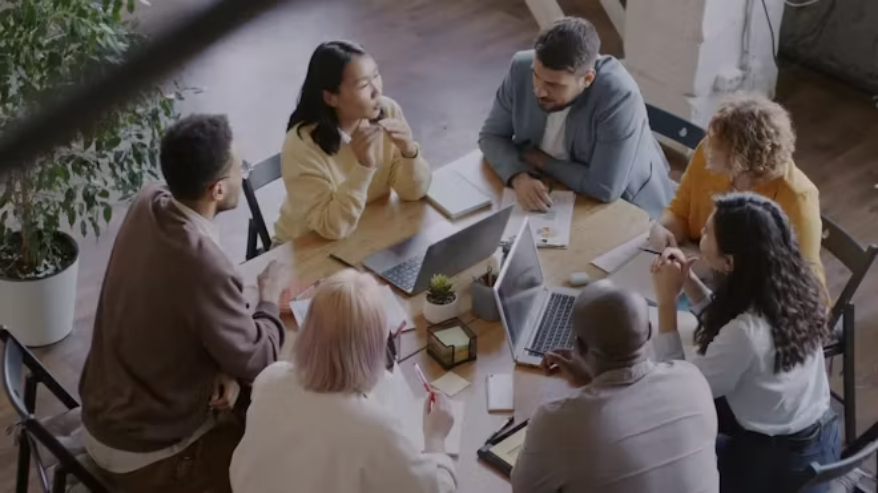 Professionals reviewing contracts, documents and obligations through a controlled process.
